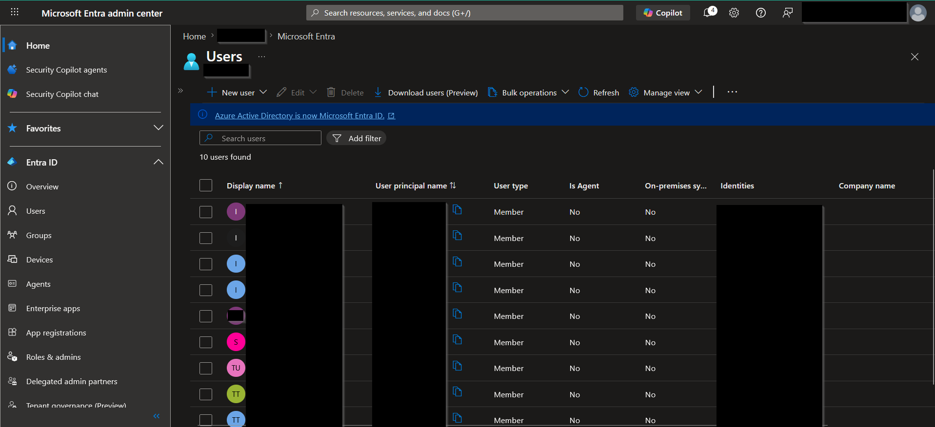 Microsoft Entra ID user directory list with admin and standard accounts.